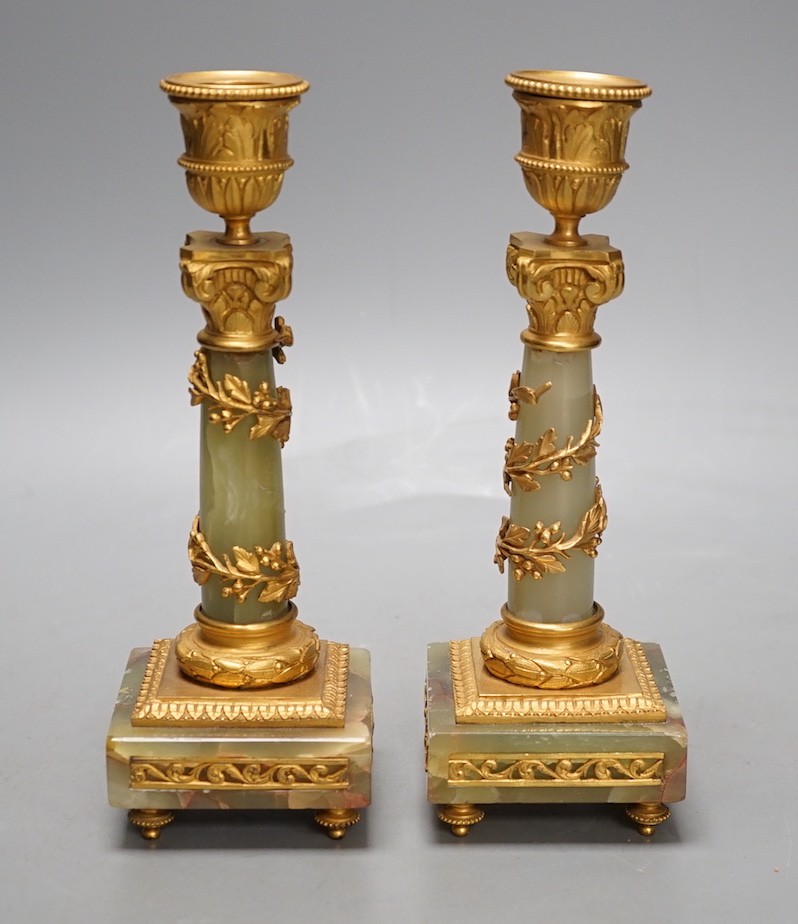 A pair of neoclassical revival green onyx and ormolu candlesticks, c.1900 - 20cm tall